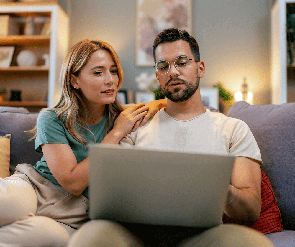 Relaxed couple browsing online